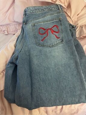 Forever 21 Light Blue Straight Leg Jeans with Red Bow Pocket